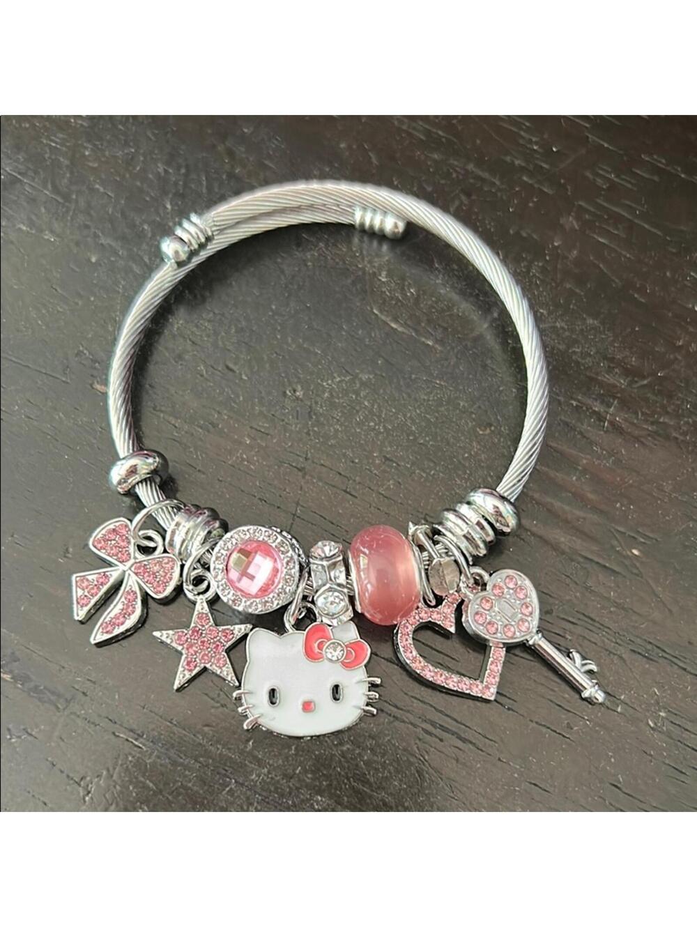 Silver Charm Bracelet with Pink Accents